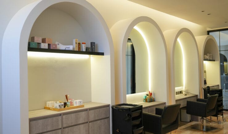 Nail salon arched display shelves interior design Riyadh - Meraki Design Build
