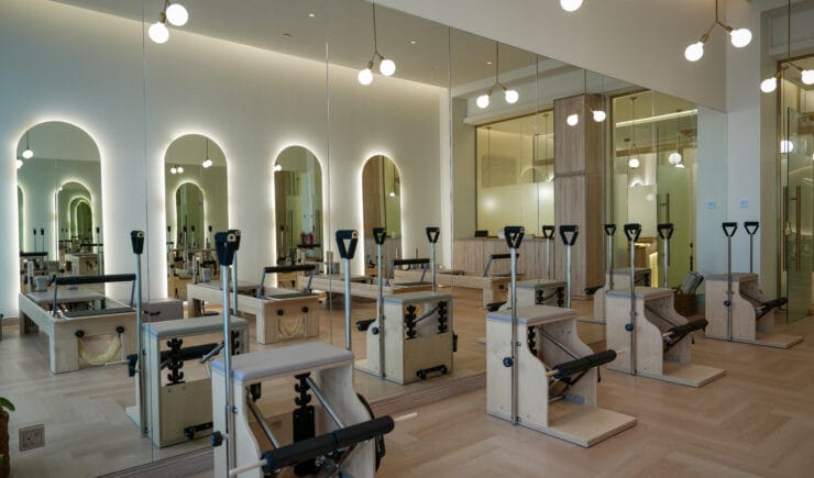 Pilates reformer studio mirrored interior design Riyadh - Meraki Design Build