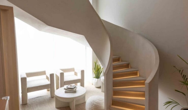 Boutique pilates studio curved staircase interior design Riyadh - Meraki Design Build