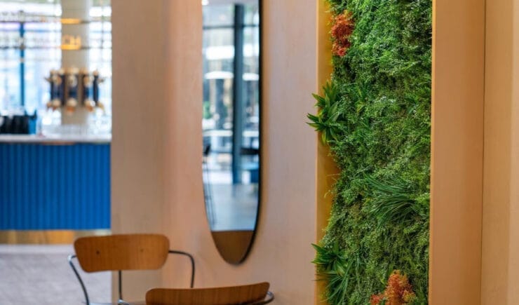 Restaurant green wall biophilic interior design Riyadh - Meraki Design Build